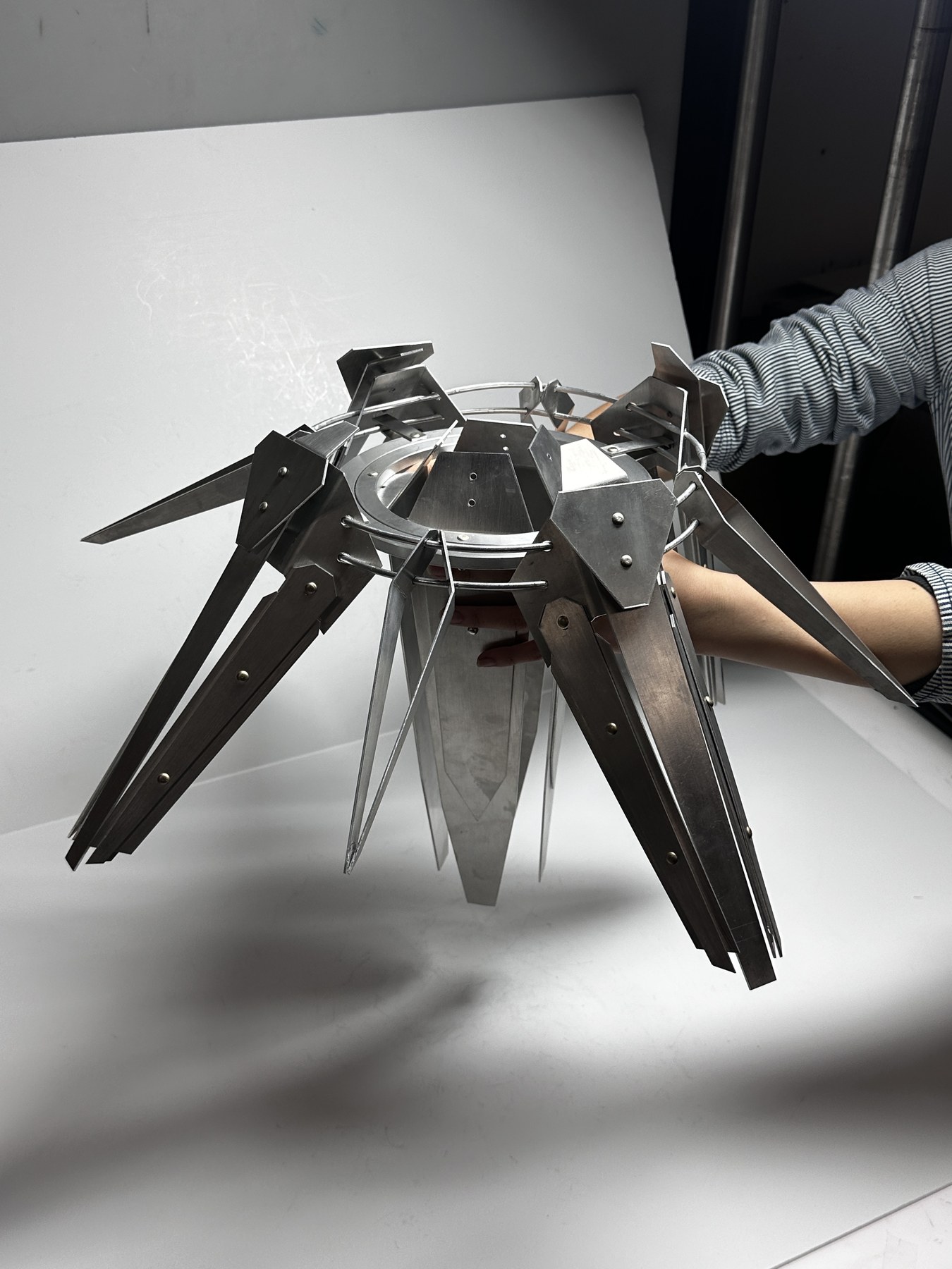 Aluminum Rectifier held in two hands to show its scale