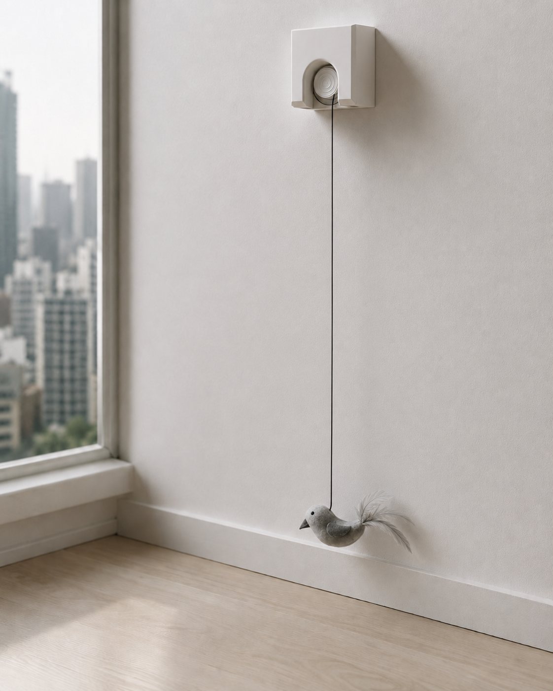 Rendered CATCH wall device with suspended soft bird prey